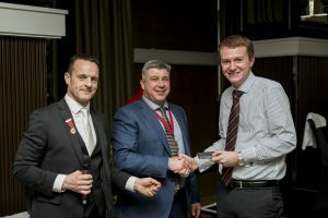 klenzan receiving award