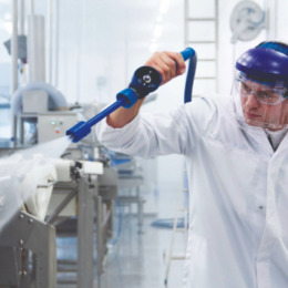 Man cleaning in food industry